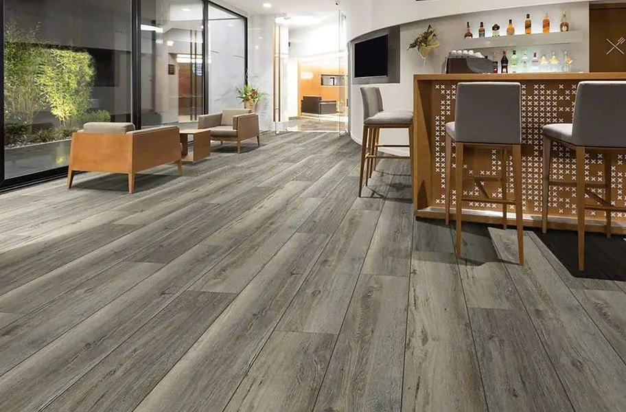 wiide plank wood-look flooring in a ktichen